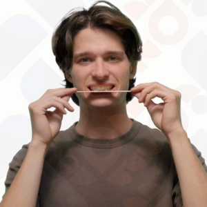 Szpatułka w ustach - ćwiczenie na domykanie ust / A05 - PL Szpatułka w ustach A05 - PL - złączone zęby